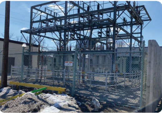 Existing metal support structure to be removed and replaced with modern, lower profile equipment.